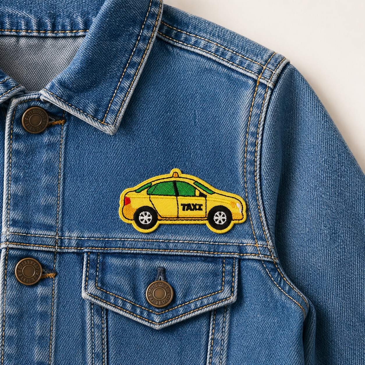 Taxi Gul - Strykbart tygmärke
